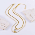Double-layered gold necklace featuring snake chain and iridescent square gemstone pendant - Quadrilateral/Retro Square