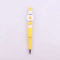 Detail of yellow beaded pen featuring a white daisy flower topper and sparkling rhinestones - Yellow & White Daisy