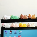 Mini resin animal figurines set including bear, pig, and duck for monitor decoration - Set of 8 Lying Animals
