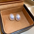 Close-up of teardrop pearl earrings with iridescent luster in a brown velvet jewelry box - Teardrop Iridescent Bean (117#) / Pearl White