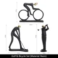 Modern black and gold resin athlete figurines set including golfer and cyclist icons - Gold Golf Bike Combination