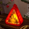 Detail of red Christmas lantern with pine tree silhouette and warm LED light effect - Triangle Lantern-Red Christmas Tree