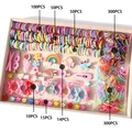 Variety pack of colorful children hair accessories including rainbow clips and flower ties - B73 (839-Piece OPP Set No Box)