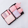 Rosa Reise-Organizer-Set mit Netztaschen und Beuteln in einem Koffer verstaut - 7-teiliges Set / Rosa