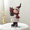 Christmas girl resin figurine in red scarf and hat holding gift box, height 17cm - Standing Girl with Gift Box