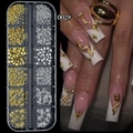 Detail of 12-grid nail art kit with gold and silver metal charms and model hand display - Star and Rose Style (002#)