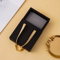 Elegant black matte jewelry drawer box with golden ribbon handle and soft grey insert - Black (No Logo)