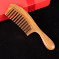 Green sandalwood hair comb with a round handle and fine teeth on a black velvet surface - Style 19/20cm*5.5cm*1.2cm