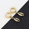 Detail of gold seashell pendants hanging from polished metal hoop earrings on a grid background - Shell - Gold