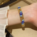 Gold-tone open bangle with blue enamel floral pattern and sparkling crystal accents - 6# Bracelet-Gold-Blue Gradient Enamel Style