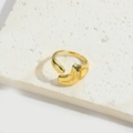 Polished 14K gold-plated open water drop ring with a sleek liquid organic design - Irregular Fluid Style