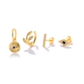 Golden four-piece earrings set featuring blue devil eye charms and leaf ear cuffs - Gold Evil Eye Leaf Earring Set (#44)