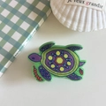 Cute green and purple turtle-shaped acrylic hair claw clip with colorful pattern for women - Turtle