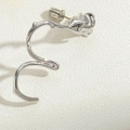 Silver rose-shaped ear cuff featuring a realistic flower and thorny vine stem design - Silver Rose Flower Ear Bone Clip
