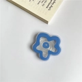 Minimalist blue flower cell phone grip with transparent round base on white surface - Blue