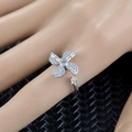 Adjustable silver spinner ring featuring a sparkling zircon four-leaf clover windmill design - Windmill Spinner