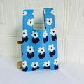Blue knit tote bag featuring large white floral patterns and a wide handle design - Floral Blue / Blue
