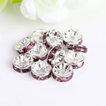 Close-up of purple crystal rondelle spacer beads with silver base for DIY jewelry making - Silver Plated Light Purple
