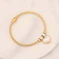 Detail of gold snake chain bracelet featuring heart charm and sparkling crystal beads - Mother of Pearl Heart (10#)