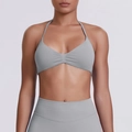 Detail view of seamless grey halter yoga sports bra and high-waist compression leggings set - Light Gray