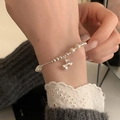 Silver beaded bracelet with white pearls and a delicate bow pendant for women - Artificial Pearl Beaded Bow (SL1412)