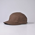 Detail view of brown canvas camper hat with metal side eyelets and reinforced stitching - Coffee
