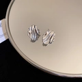 Macro detail of silver geometric earrings with water ripple texture on a mirror base - Liquid Water Ripple Style (37#)
