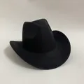 Detail view of the black wool felt cowboy hat featuring a classic curved brim and crown - Black
