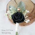 Handmade black rose boutonniere with baby's breath and silver leaves for weddings - Black