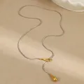 Detail of silver snake chain with golden ring and teardrop pendant, 61cm long - Two-tone Water Drop Pendant / Color Block