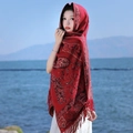 Ethnic red paisley shawl with fringe detail worn outdoors against a scenic lake - Phoenix Tail Red Ethnic Shawl