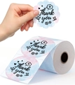 Roll of pink and blue watercolor thank you stickers being peeled from the backing - 2*2 Inch Round-500pcs (Roll)-Thank You / Starry Sky Color