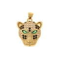 Macro shot of a gold-toned leopard head pendant with sparkling green and black stones - Crafted Leopard Head