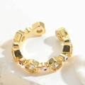 Detailed close-up of golden adjustable ring with evil eye and hexagonal zircon settings - Colorful Enamel V1