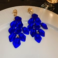 Elegant blue petal-shaped earrings with gold metal accents on a white display plate - Blue Silver Pin Acrylic Petal Tassel Studs