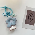 Detail of light blue embroidered flower plush keychain with white cloud and blue coil strap - Light Blue Floral