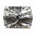 White bohemian paisley knot headband with a cross-twist design in soft knit fabric - White Paisley