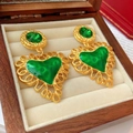 Detail of vintage gold earrings with green enamel hearts in a luxury jewelry display box - Silver Earring Post Rhinestone Circle Heart Earrings