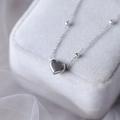 Macro shot of silver heart pendant necklace on light gray velvet jewelry display box - 21+5cm / Anklet / Silver