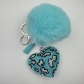 Detailed view of light blue plush ball keychain with leopard heart rhinestone and tassel - Lake Blue