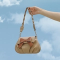 Beige PU leather crossbody bag with brown bow decoration and woven shoulder strap - Khaki