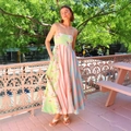 Detail view of colorful patchwork floral dress with thin straps and side pocket - S / Green Pink Floral