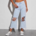 Vintage lichtblauwe damesjeans met wijde pijpen en modieuze gaten in de knieën - S / Lichtblauw