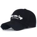 Distressed black golf cap with white Swordsman embroidery and ripped brim detail - Black
