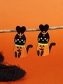 Close-up of Halloween black cat in pumpkin costume earrings hanging on a dry branch - WS10-5 (Pumpkin Cat)