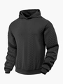 Detail van de hoogwaardige zwarte jacquard stoftextuur en naden op de herenhoodie - S / Zwart