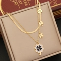 Double-layered gold clover necklace with snake chain displayed in a beige jewelry box - 1# Necklace