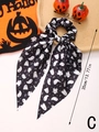 Detail of Halloween hair scrunchie with long ribbons and cute white ghost BOO prints - Style C