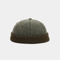 Detail view of vintage Miki Hat featuring green washed canvas and brown corduroy brim - Army Green