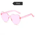 Frameless heart shaped sunglasses in trendy transparent pink color for party wear - Pink